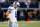 ARLINGTON, TX - DECEMBER 15:  Quarterback Tony Romo #9 of the Dallas Cowboys walks off the field after losing 37-36 to the Green Bay Packers during a game at AT&T Stadium on December 15, 2013 in Arlington, Texas.  (Photo by Tom Pennington/Getty Images)
