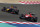 SAKHIR, BAHRAIN - APRIL 21:  (L-R) Mark Webber of Australia and Infiniti Red Bull Racing and Jules Bianchi of France and Marussia drive side by side during the Bahrain Formula One Grand Prix at the Bahrain International Circuit on April 21, 2013 in Sakhir, Bahrain.  (Photo by Clive Mason/Getty Images)