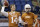 Texas Longhorns's David Ash, left, and Case McCoy, right, throw before the Valero Alamo Bowl NCAA college football game against Oregon, Monday,  Dec. 30, 2013, in San Antonio. Case will start in the place of Ash who in injured. (AP Photo/Eric Gay)
