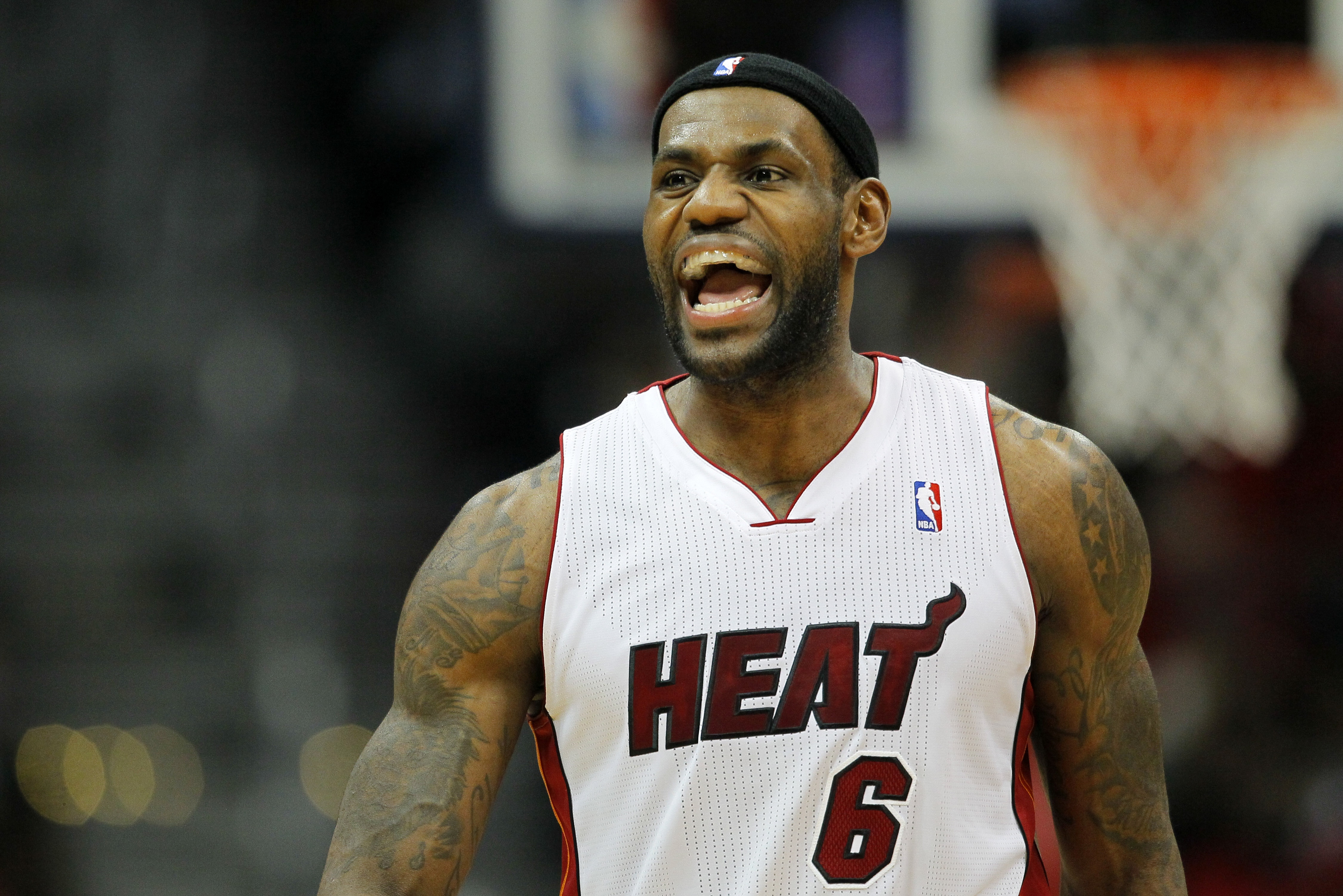 Miami Heat small forward LeBron James (6) reacts in the fourth period in an NBA basketball game against the Atlanta Hawks in Atlanta, Monday, Jan. 20, 2014. Hawks won the game 121-114 (AP Photo/Todd Kirkland)