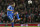 Chelsea's Juan Mata chips a pass to a teammate during their English League Cup soccer match between Arsenal and Chelsea at the Emirates stadium in London Tuesday, Oct. 29, 2013. (AP Photo/Alastair Grant)