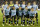 FILE - In this Oct. 15, 2013 file photo, Uruguay soccer team poses prior to the start the 2014 World Cup qualifying soccer match between Uruguay and Argentina in Montevideo, Uruguay. Foreground from left: Diego Perez, Egidio Arevalo, Maximiliano Pereira, Jorge Fucile and Cristian Rodriguez. Background from left: Edinson Cavani, Fernando Muslera, Christian Stuani, Diego Lugano, Luis Suarez and Diego Godin. The draw for the 2014 World Cup finals takes place Friday Dec. 6, 2013 near Salvador, Brazil. The 32 teams will be drawn into eight groups of four. The top two in each group will progress to the knockout stages. Twelve stadiums in twelve cities will host matches. (AP Photo/Matilde Campodonico, File)
