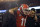 Georgia quarterback Aaron Murray (11) yells as he is helped off the field after being injured in the first half of an NCAA college football game against Kentucky, Saturday, Nov. 23, 2013, in Athens, Ga. (AP Photo/John Bazemore)