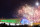 Fireworks are shot over Fisht Olympic Stadium, right, and Adler Arena, left, at the conclusion of a rehearsal for the opening ceremony at the 2014 Winter Olympics, Saturday, Feb. 1, 2014, in Sochi, Russia. (AP Photo/David Goldman)