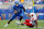 LEXINGTON, KY - SEPTEMBER 19:  Chris Matthews #8 of the Kentucky Wildcats runs with the ball while defended by Anthony Conner #35 of the Louisville Cardinals during the game at Commonwealth Stadium on September 19, 2009 in Lexington, Kentucky.  (Photo by Andy Lyons/Getty Images)