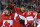 Canada defenseman Shea Weber, center, celebrates with forward Sidney Crosby, left, and forward Patrice Bergeron after scoring a goal against Norway in the second period of a men's ice hockey game at the 2014 Winter Olympics, Thursday, Feb. 13, 2014, in Sochi, Russia. (AP Photo/Julio Cortez)