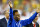 FOXBORO, MA - SEPTEMBER 10: Former Brazillian soccer player, Pele, waves to the crowd prior to the international friendly match between Brazil and Portugal at Gillette Stadium on September 10, 2013 in Foxboro, Massachusetts. (Photo by Jared Wickerham/Getty Images)
