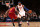 NEW YORK, NY - JANUARY 30: Carmelo Anthony #7 of the New York Knicks dribbles against Earl Clark #6 of the Cleveland Cavaliers during a game at Madison Square Garden in New York City on January 30, 2014.  NOTE TO USER: User expressly acknowledges and agrees that, by downloading and or using this photograph, User is consenting to the terms and conditions of the Getty Images License Agreement. Mandatory Copyright Notice: Copyright 2014 NBAE  (Photo by Nathaniel S. Butler/NBAE via Getty Images)
