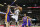 Memphis Grizzlies forward James Johnson (3) goes to the basket against Los Angeles Lakers defenders Pau Gasol, left, Wesley Johnson (11) and Jordan Farmar (1) in the second half of an NBA basketball game, Wednesday, Feb. 26, 2014, in Memphis, Tenn. The Grizzlies won 108-103. (AP Photo/Lance Murphey)