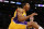 Los Angeles Lakers' Wesley Johnson reacts after dunking the ball on an alley-oop pass from Kendall Marshall against the Utah Jazz during the second half of an NBA basketball game in Los Angeles, Tuesday, Feb. 11, 2014. The Jazz won 96-79. (AP Photo/Danny Moloshok)