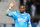 Marseille's French goalkepper Steve Mandanda, waves to supporters, after the League One soccer match against Valenciennes, at the Velodrome Stadium, in Marseille, southern France, Wednesday, Jan. 29, 2014. (AP Photo/Claude Paris)