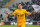 Verona's Juan Manuel Iturbe  celebrates after scoring, during a Serie A soccer match between Udinese and Verona at the Friuli Stadium in Udine, Italy, Monday, Jan. 6, 2014. (AP Photo/Paolo Giovannini)