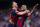 BARCELONA, SPAIN - MARCH 16: Lionel Messi of FC Barcelona celebrates with his team mate Daniel Alves after scoring his team's sixth goal during the La Liga match between FC Barcelona and CA Osasuna at Camp Nou on March 16, 2014 in Barcelona, Spain. (Photo by Alex Caparros/Getty Images)