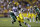 Anthony Johnson (90) rushes the passer in the first half of an NCAA college football game against UAB in Baton Rouge, La., Saturday, Sept. 7, 2013. (AP Photo/Gerald Herbert)