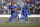 Afghanistan's batsmen Gulbadin Naib, left, and Najibullah Taraki run between the wickets during the ICC Twenty20 Cricket World Cup opening match against Bangladesh in Dhaka, Bangladesh, Sunday, March 16, 2014. (AP Photo/Aijaz Rahi)