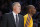 Los Angeles Lakers' Kobe Bryant, right, walks past head coach Mike D'Antoni in the second half of an NBA basketball game against the Brooklyn Nets in Los Angeles, Tuesday, Nov. 20, 2012. The Lakers won 95-90. (AP Photo/Jae C. Hong)