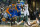 Milwaukee Bucks' Ersan Ilyasova is fouled by New York Knicks' Carmelo Anthony during the first half of an NBA basketball game, Monday, Feb. 3, 2014, in Milwaukee. (AP Photo/Tom Lynn)