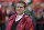 Washington Redskins owner Daniel Snyder watches his team warm up before an NFL football game against the Atlanta Falcons in Landover, Md., Sunday, Oct. 7, 2012. (AP Photo/Richard Lipski)