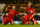 Liverpool's Jon Flanagan celebrates with teammates Jordan Henderson and Mamadou Sakho.