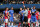 Referee Andre Marriner, in grey, sends off Arsenal's Kieran Gibbs, left, during their English Premier League soccer match between Chelsea and Arsenal at Stamford Bridge stadium in London Saturday, March 22  2014. (AP Photo/Alastair Grant)