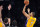 March 19, 2014; Los Angeles, CA, USA; Los Angeles Lakers forward Xavier Henry (7) shoots against the San Antonio Spurs during the second half at Staples Center. Mandatory Credit: Gary A. Vasquez-USA TODAY Sports