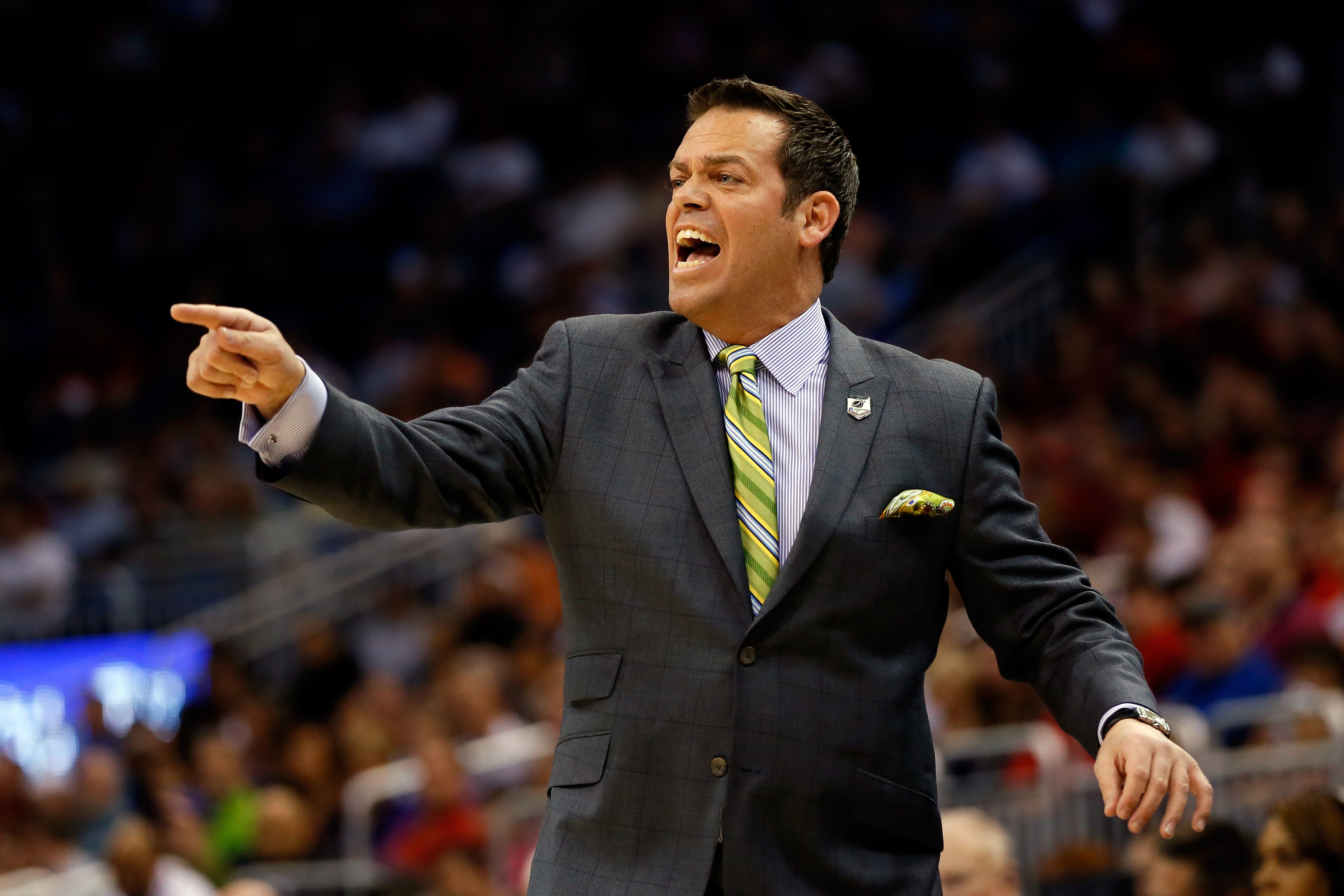 ORLANDO, FL - MARCH 20: Head coach Steve Masiello of the Manhattan Jaspers shouts to his players against the Louisville Cardinals during the second round of the 2014 NCAA Men's Basketball Tournament at Amway Center on March 20, 2014 in Orlando, Florida. (Photo by Kevin C. Cox/Getty Images)