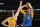 Dallas Mavericks forward Dirk Nowitzki (41), of Germany, shoots over Los Angeles Lakers forward Ryan Kelly during the second half of an NBA basketball game, Friday, April 4, 2014, in Los Angeles. The Mavericks won 107-95. (AP Photo/Gus Ruelas)