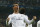 Real's Cristiano Ronaldo celebrates scoring his side's 3rd goal during a Champions League quarterfinal first leg soccer match between Real Madrid and Borussia Dortmund at the Santiago Bernabeu   stadium in Madrid, Spain, Wednesday, April 2, 2014. (AP Photo/Andres Kudacki)