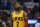 Cleveland Cavaliers's Kyrie Irving walks on the court during the first half of an NBA basketball game against the Los Angeles Clippers on Sunday, March 16, 2014, in Los Angeles. (AP Photo/Jae C. Hong)