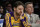 Los Angeles Lakers' Pau Gasol, of Spain, covers his face while sitting on the bench during the second half of an NBA basketball game against the Los Angeles Clippers on Thursday, March 6, 2014, in Los Angeles. The Clippers won 142-94. (AP Photo/Jae C. Hong)