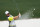 Rory McIlroy, of Northern Ireland, hits out of a bunker on the second hole during the fourth round of the Masters golf tournament Sunday, April 13, 2014, in Augusta, Ga. (AP Photo/Matt Slocum)