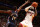 MIAMI, FL - March 3: LeBron James #6 of the Miami Heat shoots against the Charlotte Bobcats at the American Airlines Arena in Miami, Florida on Mar. 3, 2014. NOTE TO USER: User expressly acknowledges and agrees that, by downloading and/or using this photograph, user is consenting to the terms and conditions of the Getty Images License Agreement. Mandatory copyright notice: Copyright NBAE 2014 (Photo by Issac Baldizon/NBAE via Getty Images)