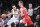 Brooklyn Nets guard Shaun Livingston (14) pushes towards the basket against Houston Rockets forward Chandler Parsons (25) during the second half of their NBA basketball game at the Barclays Center, Tuesday, April 1, 2014, in New York. The Nets defeated the Rockets, 105-96. (AP Photo/John Minchillo)