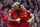 Liverpool's Martin Skrtel, left, celebrates with teammate Luis Suarez after their team beats Manchester City 3-2 in their English Premier League soccer match at Anfield Stadium, Liverpool, England, Sunday April 13, 2014. (AP Photo/Jon Super)