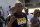 Fighter Anderson Silva, from Brazil, greets fans during the UFC Rio 3 open workouts in Rio de Janeiro, Brazil, Wednesday, Oct. 10, 2012. Silva will face Stephan Bonnar, of the U.S., on Oct. 13 at the Ultimate Fighting Championship (UFC), the organization's third event in Rio de Janeiro. (AP Photo/Silvia Izquierdo)