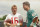 San Francisco 49ers' quarterback Joe Montana, left and Miami Dolphins quarterback Dan Marino chat during a training session at Crystal Palace, July 26, 1988, in London.  Their teams meet in a match at Wembley Stadium on July 31.  (AP Photo/Doug Jennings)