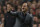 Ajax's coach Frank de Boer gestures during the Champions League Group H soccer match between Ajax Amsterdam and Celtic Glasgow at ArenA stadium in Amsterdam, Netherlands, Wednesday, Nov. 6, 2013. Ajax won the match with a 1-0 score. (AP Photo/Peter Dejong)