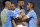 Napoli's Lorenzo Insigne, third from left, celebrates with teammates Marek Hamsik, left, Gokhan Inler, second from left, and Raul Albiol after scoring during the Italian Cup final match between Fiorentina and Napoli in Rome's Olympic stadium Saturday, May 3, 2014. (AP Photo/Gregorio Borgia)