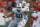 North Carolina's Russell Bodine (60) blocks for quarterback Byrn Renner (2) during the first half of a NCAA college football game in Miami, Saturday, Oct. 13, 2012. (AP Photo/J Pat Carter)