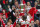 Arsenal captain Patrick Vieira shows the trophy to jubilant fans after winning the FA Cup Final at the Millennium Stadium in Cardiff, Wales, Saturday, May. 21, 2005. Arsenal beat Man United 5-4 on penalties following a 0-0 draw after extra time. (AP Photo/Alastair Grant)