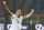 AS Roma midfielder Kevin Strootman, of the Netherlands, celebrates after scoring during the Serie A soccer match between AC Milan and Roma at the San Siro stadium in Milan, Italy, Monday, Dec. 16, 2013. (AP Photo/Antonio Calanni)