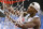 North Carolina's Rashad McCants cuts down part of the net during UNC's celebration following their 75-70 win over Illinois in the NCAA championship game Monday, April 4, 2005, in St. Louis. (AP Photo/Eric Gay)