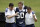 Dallas Cowboys linebacker Sean Lee is helped off the field by head athletic trainer Jim Maurer, left, and associate athletic trainer Britt Brown, right, after suffering an unknown left leg injury during an NFL football organized team activity, Tuesday, May 27, 2014, in Irving, Texas. (AP Photo/Tony Gutierrez)