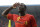 Belgium's Romelu Lukaku salutes after he scored against Luxembourg, during a friendly soccer match at the Cristal Arena stadium in Genk, eastern Belgium, Tuesday, May 26, 2014. Belgium will play against South Korea, Russia and Algeria in Group H of the World Cup 2014 in Brazil. (AP Photo/Yves Logghe)