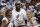 Tennis players Serena Williams, left and Caroline Wozniacki pose with Miami Heat's Greg Oden and the NBA basketball Eastern Conference championship trophy, Friday, May 30, 2014, in Miami. The Miami Heat defeated the Indiana Pacers 117-92 to advance to the NBA finals. (AP Photo/Lynne Sladky)