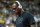 USA's Lebron James wear headphones as he arrives to watch Argentina play Brazil during a men's quarterfinals basketball game at the 2012 Summer Olympics, Wednesday, Aug. 8, 2012, in London. (AP Photo/Charles Krupa)