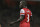 Arsenal's Bacary Sagna gestures to a teammate as he plays against Wigan Athletic during their English Premier League soccer match at Arsenal's Emirates stadium in London, Tuesday, May  14, 2013. (AP Photo/Alastair Grant)