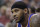 New York Knicks' Carmelo Anthony (7) looks on as he sits on the bench in the second quarter during an NBA basketball game against the Utah Jazz Monday, March 31, 2014, in Salt Lake City. (AP Photo/Rick Bowmer)