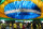 Soccer fans walk below a street decoration of the Brazilian flag, during the Brazil soccer World Cup match against Cameroon, in Manaus, Brazil, Monday, June 23, 2014. Brazil's Neymar scored twice in the first half to lead Brazil to a 4-1 win over Cameroon on Monday, helping the hosts secure a spot in the second round of the soccer World Cup. (AP Photo/Martin Mejia)