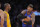 Los Angeles Lakers guard Kobe Bryant, left, and New York Knicks forward Carmelo Anthony prior to their NBA basketball game, Thursday, Dec. 29, 2011, in Los Angeles. The Lakers won 99-82.  (AP Photo/Mark J. Terrill)